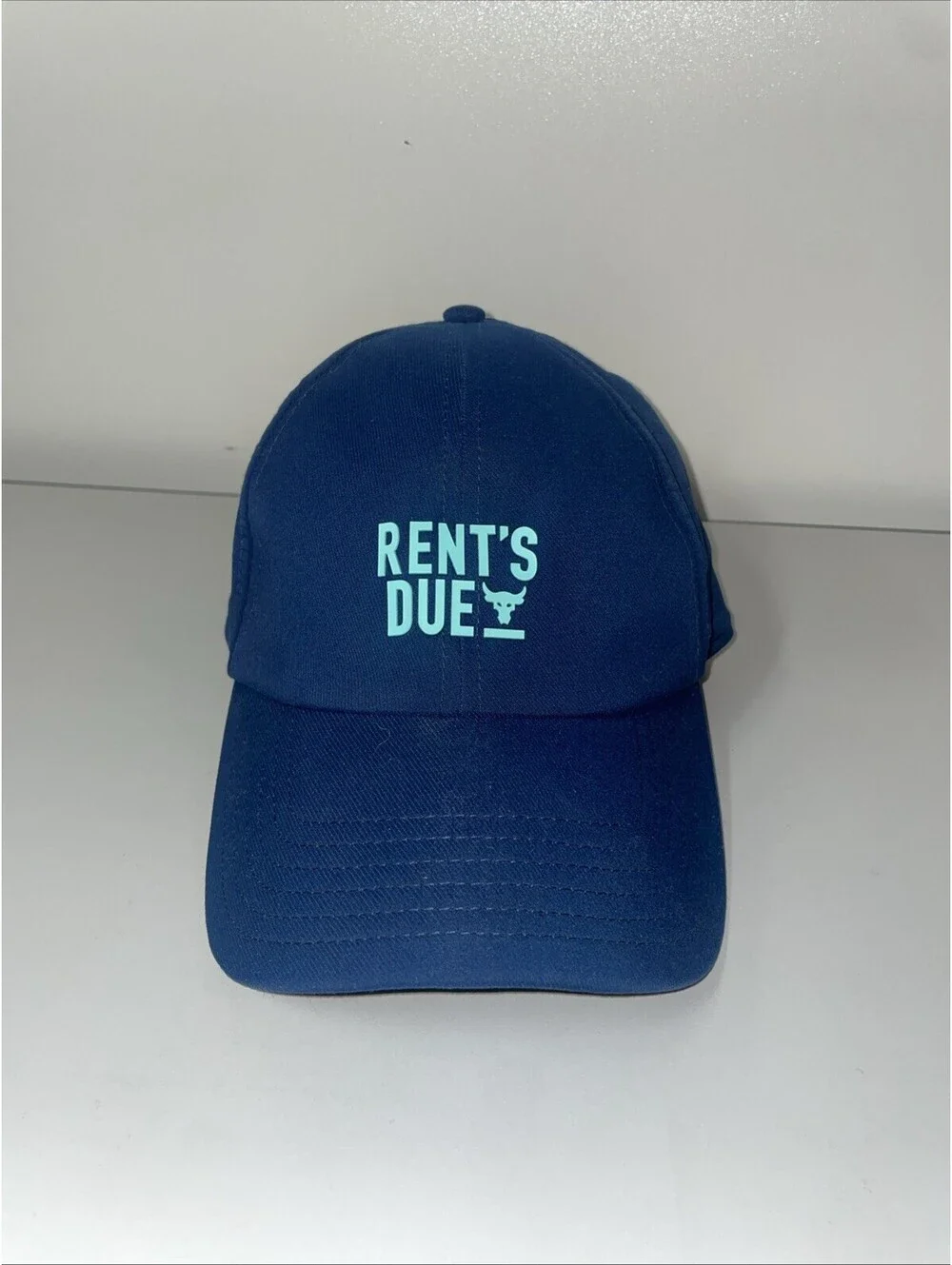 “Project Rock ‘Rent’s Due’ Hat - Dwayne Johnson Under Armour Bull Logo Navy Cap”